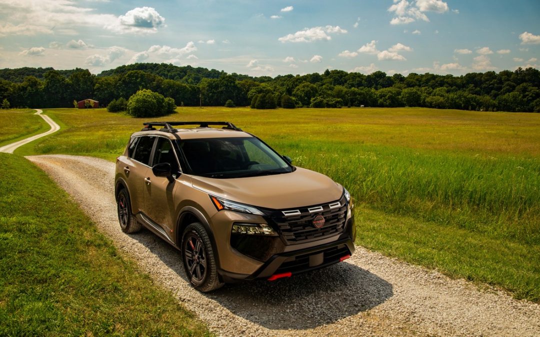 2026 Nissan Rogue Rock Creek driving on a country road for Nissan service and maintenance near McDonough, GA
